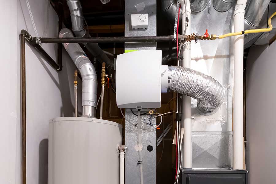 Whole-house humidifier installed on home HVAC duct system