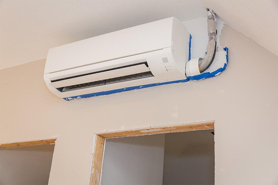 Ductless mini-split AC unit installation inside
