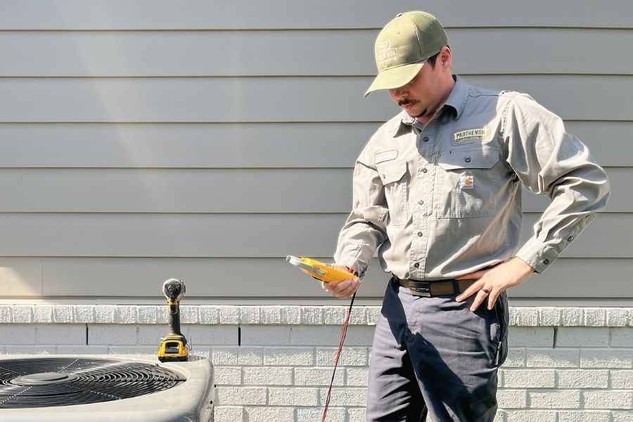 Tech outside in checking system diagnostics in Hendersonville