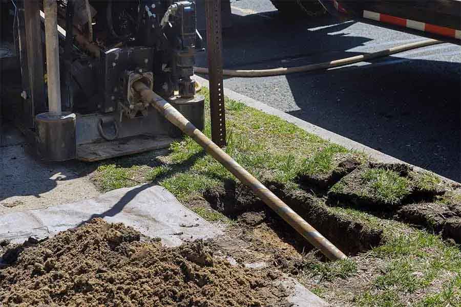New main water line being installed beneath a Nashville yard